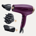 Flat lay of a stylish hair dryer and hair brush on a soft background, representing essential hair styling tools for women in 2025.