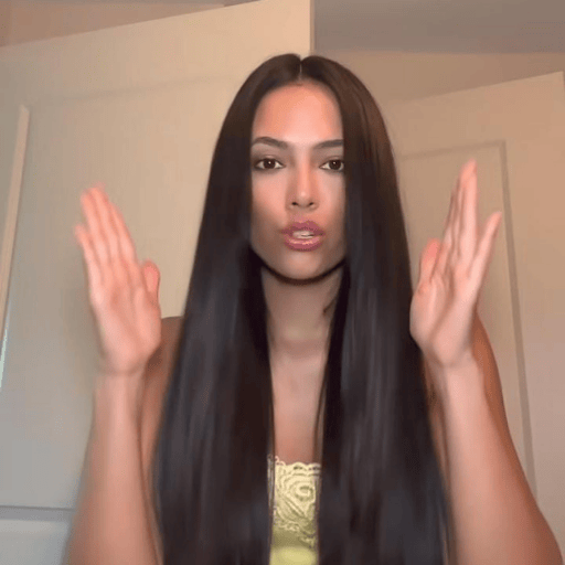 Long straight hairstyle with center part, trending in 2025 across the USA for a timeless, sleek, and elegant look.