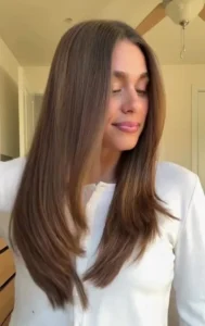 Glass hair finish on sleek straight hair, a top 2025 trend in the USA focused on mirror like shine and smooth texture.