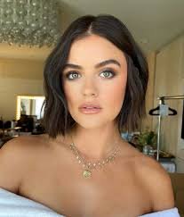 Lucy Hale with a French-inspired short bob haircut, a trending celebrity short hairstyle for 2025.